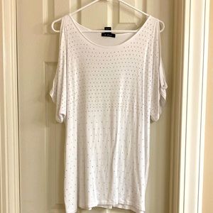 Blouse- with cold shoulders elbow length. size med. With silver small dots.